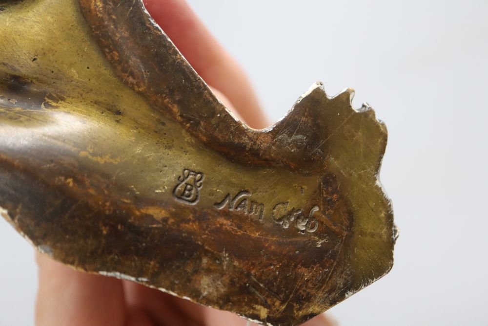 A cold painted bronze of a nude female, signed Nam Greb?, length 15.5cm
